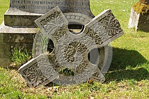 Cemetery fallen broken Celtic cross