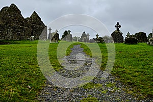 The cemetery in the medieval monastery of Clonmacnoise, Ireland, during a rainy summer day