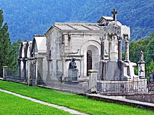 A cemetery near the church in Someo, Magic Valley or Valle Magia Valle Maggia photo