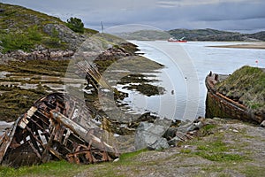 Cemetery of old abandoned ships on the coast of the Barents Sea in Teriberka, Russia