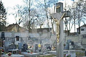 Cemetery with tombstones in the shape of a cross, angels. Many decorated graves