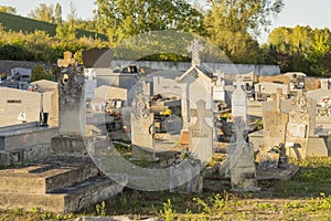 In a cemetery, view of old tombstones