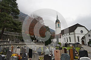 Cemetery in village Altdorf, in canton Uri, captured in autumn.