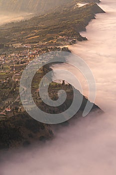Cemoro Lawang village at Bromo volcano mountain in, East Java, Indonesia with beautiful sunrise and sea of fog