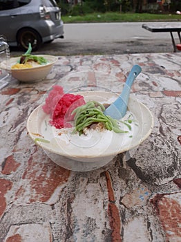 Cendol with glutinous rice is the favorite food of Malaysians as a dessert