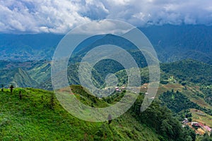 Cenery of Cat Cat village, popular tourist trekking destination. Rice field terraces.  Mountain view in the clouds. Sapa, Lao Cai