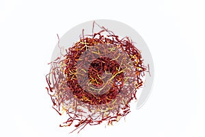 Cenital view of saffron threads isolated on white background photo