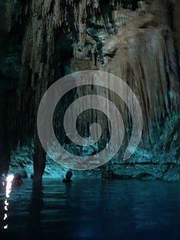 Cenote cavern in Yucatan, Mexico with crystal clear water.