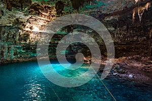 Cenote Samula Dzitnup near Valladolid, Yucatan, Mexico - swimming in crystal blue water