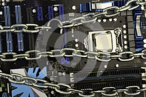Censorship, restrictions and restrictions on a Internet. concept, motherboard in chains under lock and key