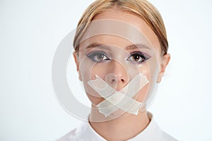 Censorship of woman theme. Closed mouth