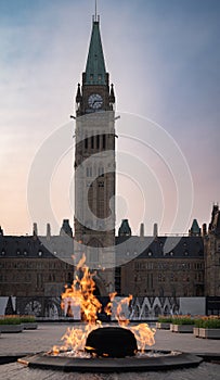 Centennial Flame on Parliament Hill in front of the Peace Tower, Ottawa, Canada photo