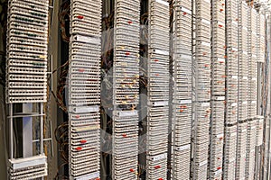 Center for Analogue Telephone Communication. Switchboard ip telephony data center located in the server room. A copper cross panel