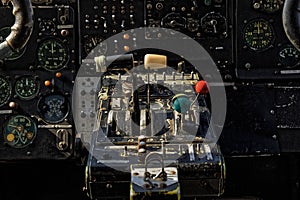 Center console and throttles in an old airplane