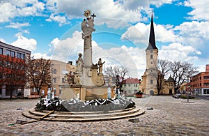 Center of the old town. Holy trinity and Roman Catholic Churchon the city plaza. Main square of city in southern Slovakia. Nove