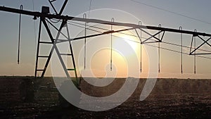 Center pivot irrigation at sunset 7