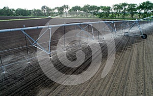 Center pivot irrigation system on field