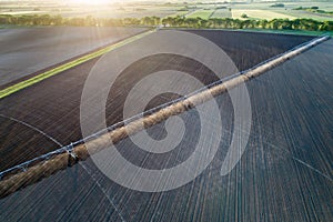 Center pivot irrigation system on field