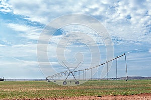 Center pivot irrigation system in operation near Orania