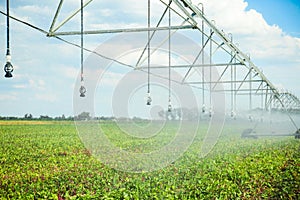 Center pivot irrigation system watering agricultural field
