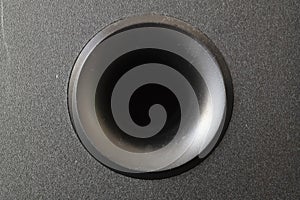 Centered speaker hole in black