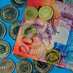 Centim coins and a twenty franc note