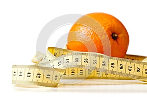 Centimetric tape and orange