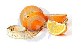 Centimetric tape and oranges