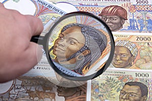 Central African money in a magnifying glass