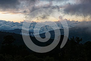 Central America Cloudy forest - Costa Rica landscape in Los Quetzales, beautiful view to primaeval green cloudy forest and blue