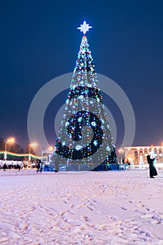 New Year tree in the center of the square photo