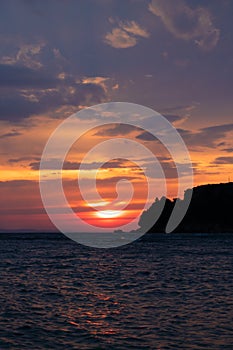 Romantic windy sunset on the beach in Central Dalmatia, Croatia photo