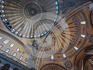 central dome of Hagia Sophia converted into a mosque, painting ceilings and vault in Santa Sofia, orange and blue , Istanbul,