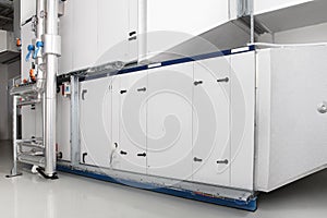 Central heating and cooling air handling system