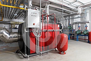 Central heating and cooling system control in a boiler room