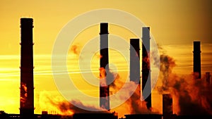 Central heating and power plant on beautiful sunset background