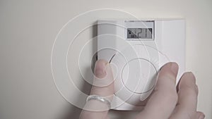 Central heating thermostat