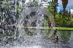 The central lake with waterfall in the Monte Palace Tropical Garden. Funchal, Madeira, Portugal