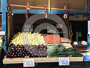 Central Market in Budapest Hungary with people doing weekend shopping.