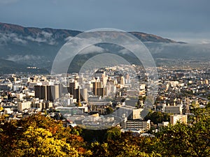 Central Matsumoto city at sunset, scenic view from Joyama park observation tower