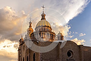 Central Mexico, Aguascalientes catholic churches, colorful streets and colonial houses in historic city center near photo