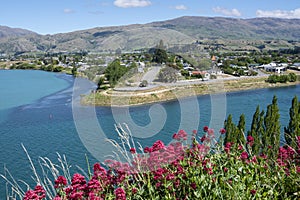 Central Otago town of Cromwell on bend in turquoise  Clutha River in Central Otago New Zealand