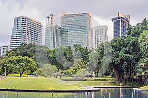 Central Park in Kuala Lumpur against the background of skyscrapers