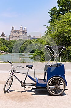 Central Park Manhattan The Lake rickshaw bike NY photo