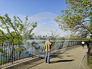 Central Park reservoir Upper West Side skyline blue sky Manhattan New York City USA