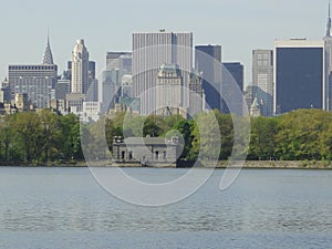 Central Park reservoir Upper West Side skyline blue sky Manhattan New York City USA