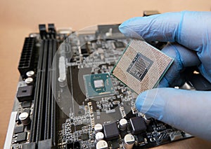 Computer micro processors in technician hand