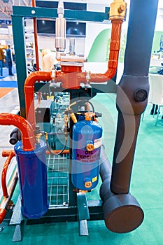 Central refrigeration machines based on reciprocating and scroll compressors