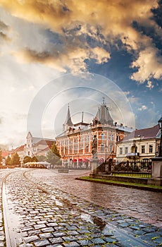 Central square in Kosice with tram rails after rain