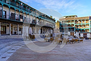 Central square of the town of Chinchon in Madrid, typical houses with wooden balconies and an old medieval atmosphere